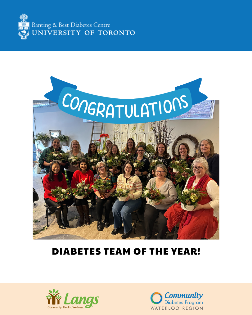 A team photo of the diabetes team including nurses and dietitians and support staff. They are standing with a row of staff seated in the front and each holding a bouquet of flowers.